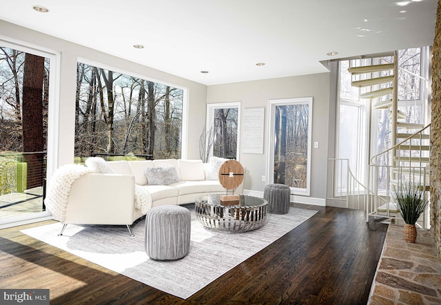 living area with recessed lighting, baseboards, and hardwood / wood-style floors