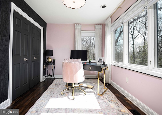 office with baseboards and dark wood-type flooring