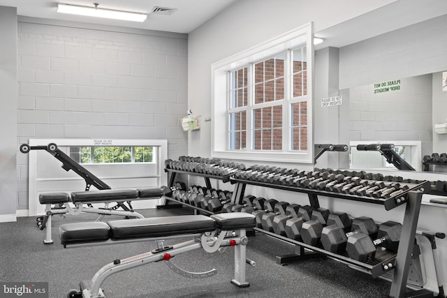 exercise room featuring visible vents