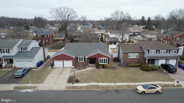 birds eye view of property with a residential view