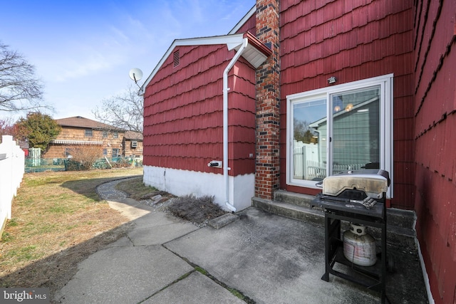 exterior space with a tile roof