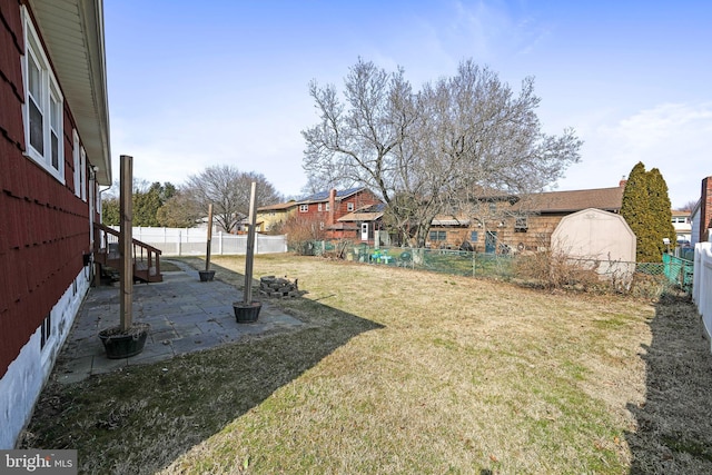 view of yard featuring a fenced backyard and a patio