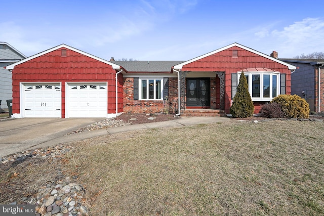 ranch-style house featuring brick siding, a chimney, a front yard, a garage, and driveway