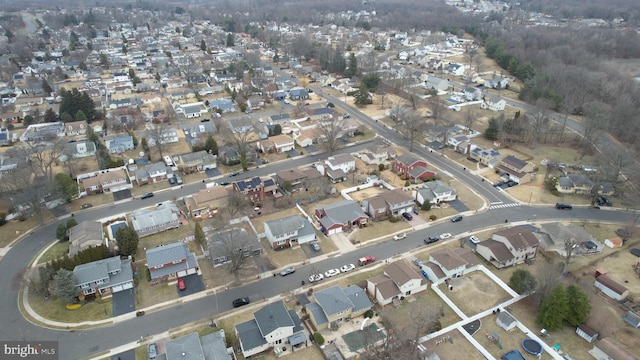 birds eye view of property with a residential view