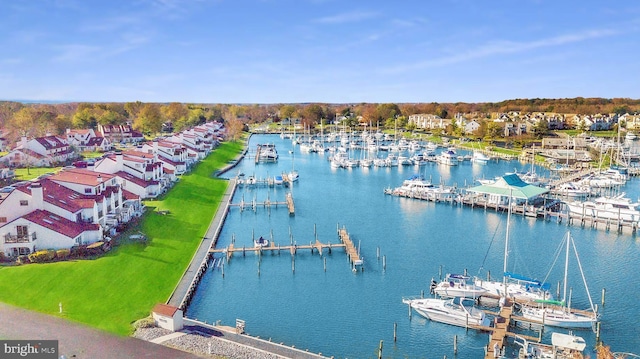 drone / aerial view with a water view