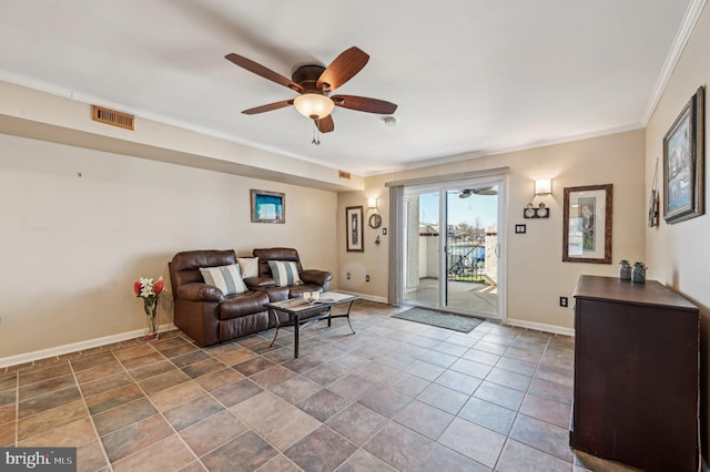 living area with visible vents, a ceiling fan, crown molding, and baseboards