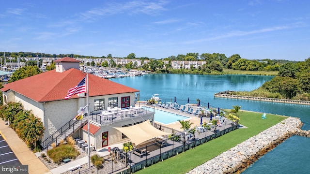 birds eye view of property featuring a water view