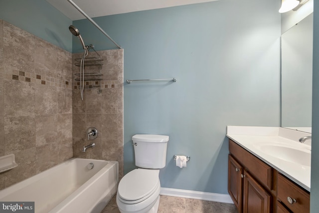 full bathroom featuring vanity, toilet, baseboards, and shower / bathtub combination