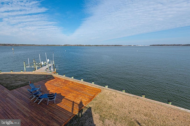 view of dock featuring a water view and boat lift