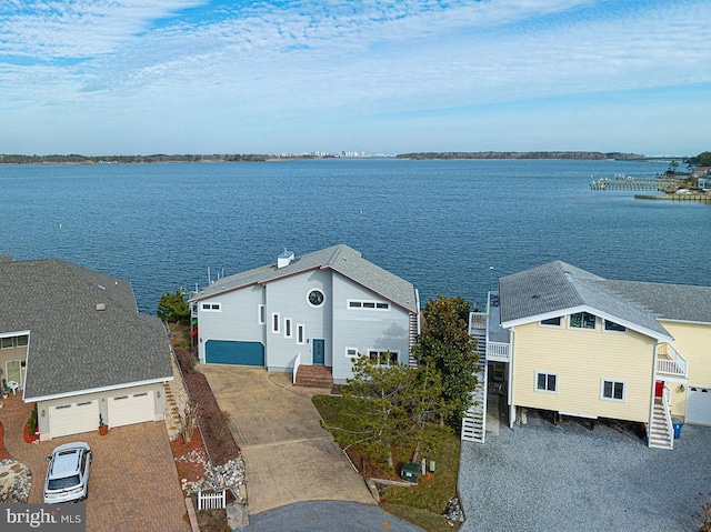 drone / aerial view with a water view