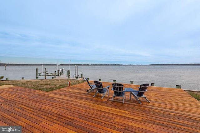 view of dock with a water view and boat lift