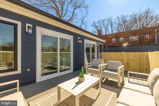 wooden deck featuring fence