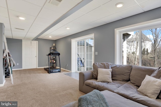 carpeted living room with recessed lighting, a paneled ceiling, and baseboards