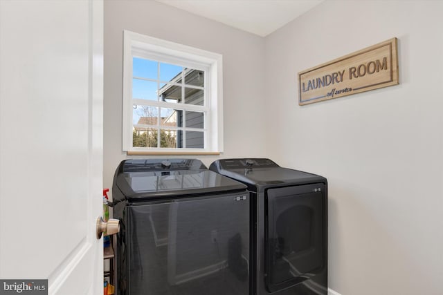 washroom with laundry area and washer and clothes dryer