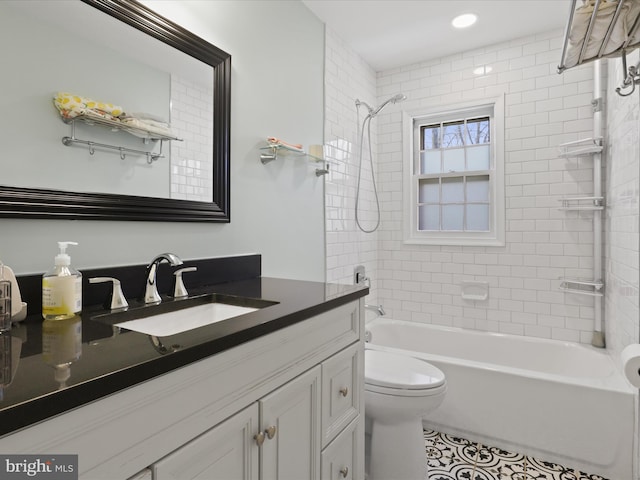 full bathroom with vanity, toilet, and bathing tub / shower combination