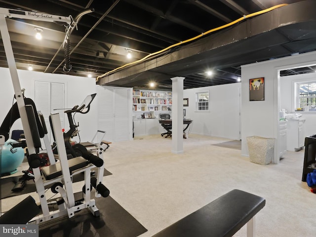 workout room featuring carpet floors