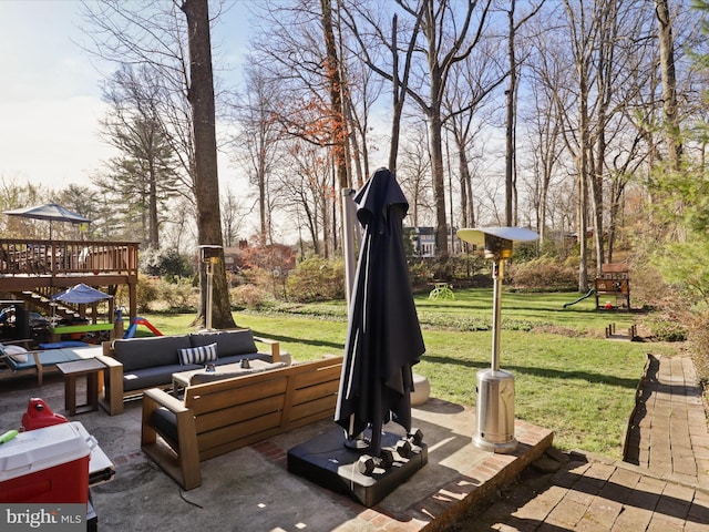 view of patio / terrace featuring an outdoor living space and a playground