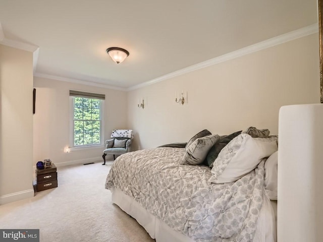 bedroom featuring light carpet, crown molding, visible vents, and baseboards