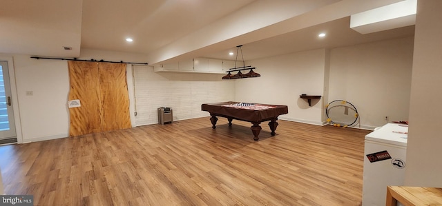 rec room with a barn door, billiards, baseboards, light wood-style flooring, and recessed lighting