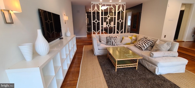 living room featuring recessed lighting and wood finished floors