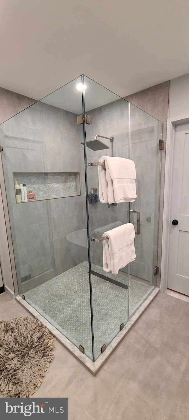 full bathroom with a shower stall