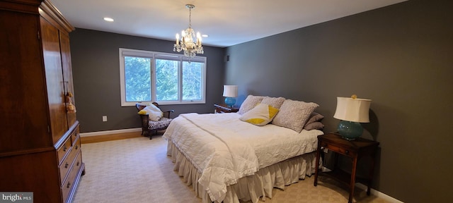 bedroom with recessed lighting, baseboards, and an inviting chandelier