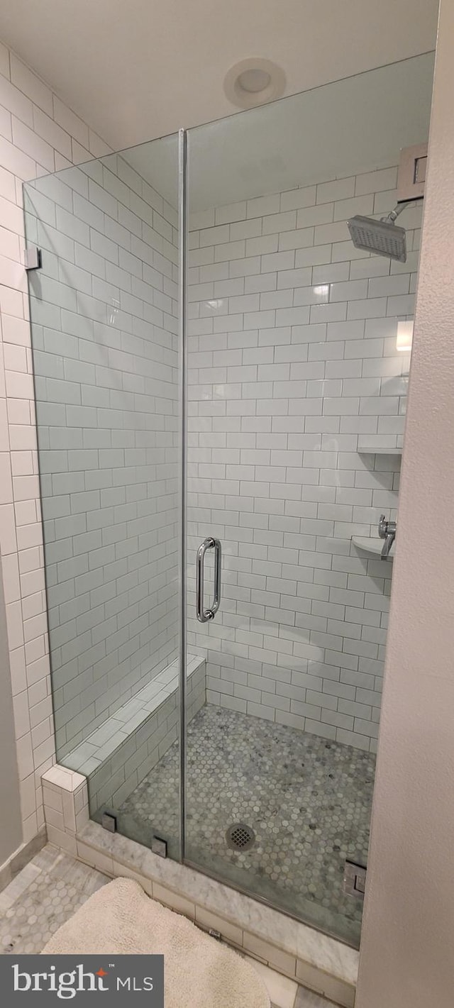 full bathroom with a stall shower