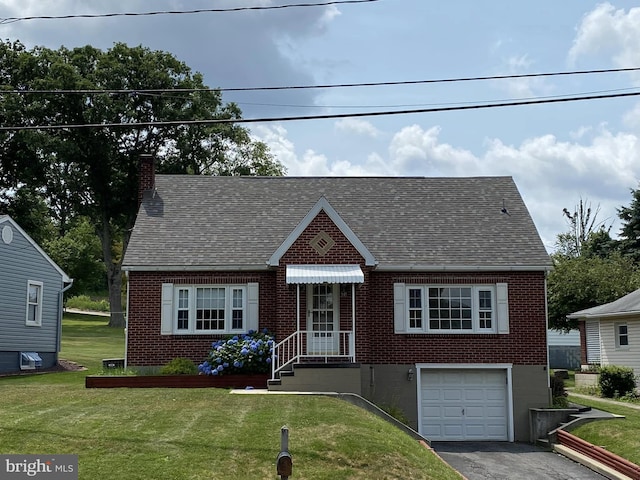 view of front facade featuring a front lawn and brick siding