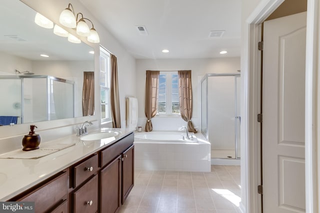 bathroom with a garden tub, tile patterned flooring, vanity, visible vents, and a shower stall