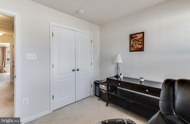 sitting room with light carpet