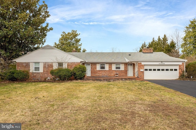 ranch-style home with brick siding, a chimney, aphalt driveway, and a garage