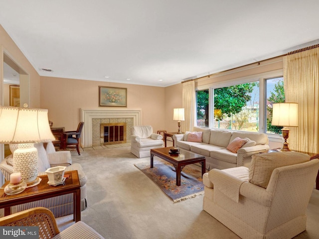 living room featuring light carpet, visible vents, and a premium fireplace