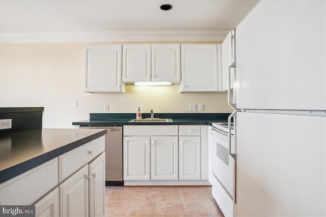 kitchen featuring white appliances, dark countertops, ornamental molding, white cabinetry, and a sink