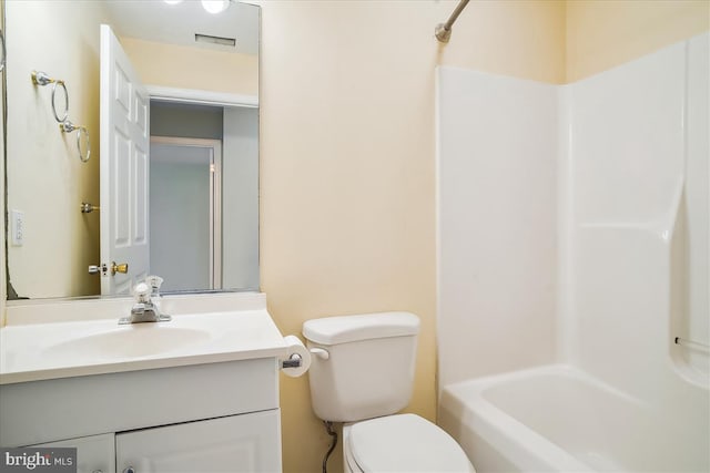 bathroom with toilet, shower / tub combination, visible vents, and vanity