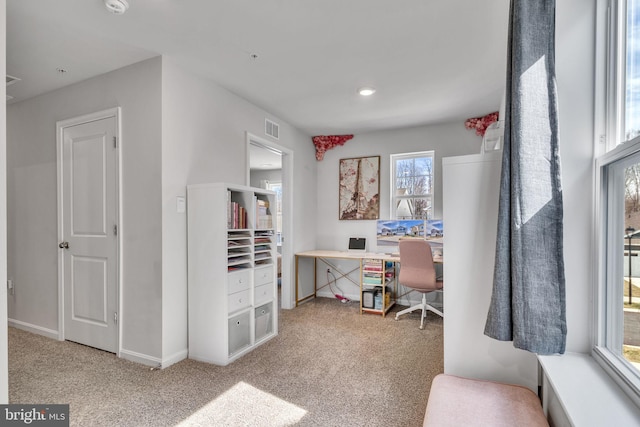 office featuring visible vents, baseboards, and carpet floors