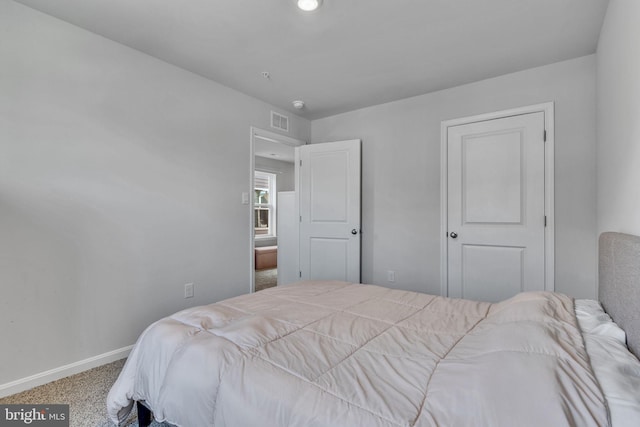 bedroom featuring carpet flooring, baseboards, and visible vents