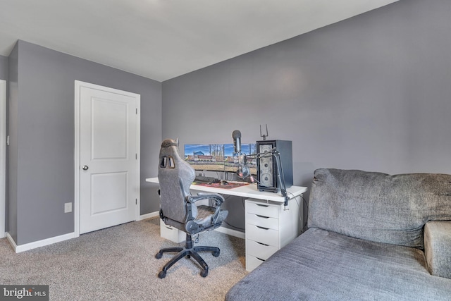 office featuring baseboards and carpet floors