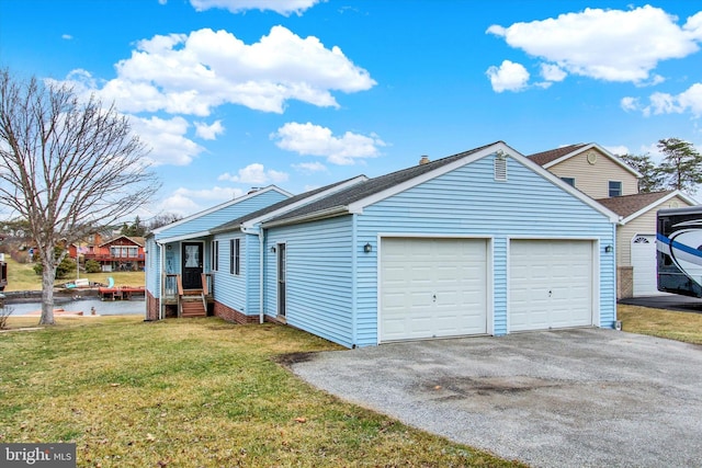 view of property exterior with aphalt driveway, a garage, a shingled roof, and a yard