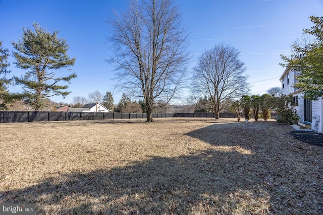 view of yard featuring fence