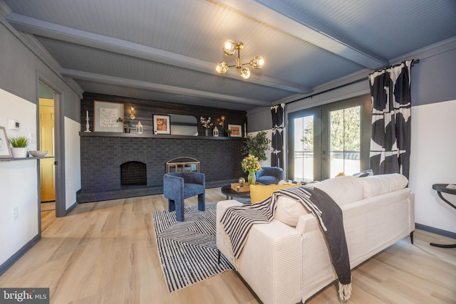 living area featuring a fireplace, wood finished floors, baseboards, french doors, and beamed ceiling