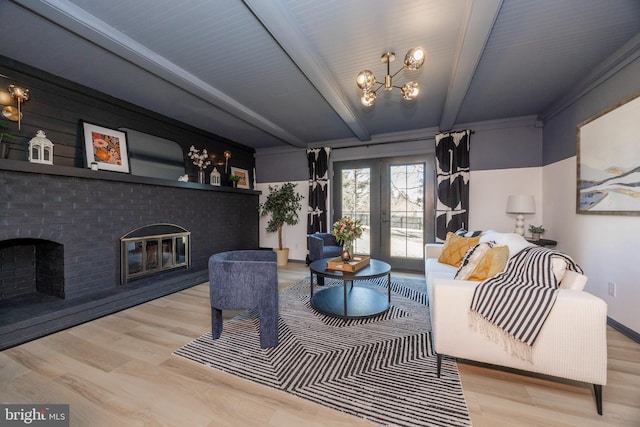 living area with french doors, beamed ceiling, a fireplace, and wood finished floors