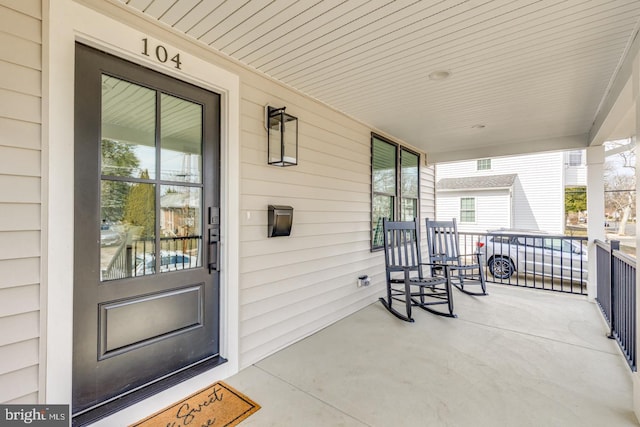 entrance to property with a porch