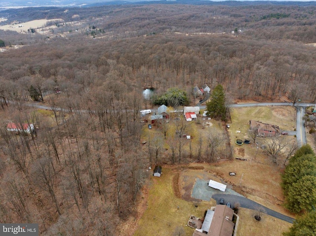 drone / aerial view with a forest view