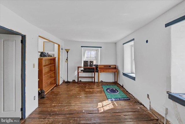 home office with hardwood / wood-style flooring