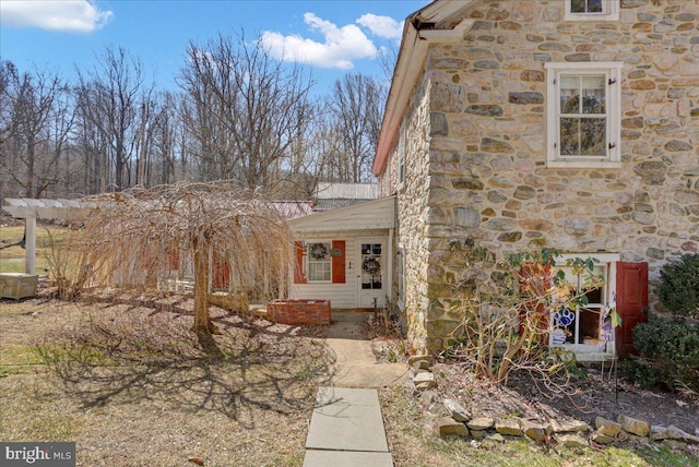 view of front of property with stone siding