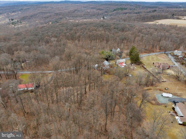 bird's eye view featuring a view of trees