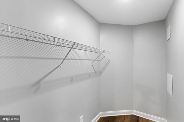 1354 Talbert Ter SE, Washington, DC 20020 - walk in closet with dark wood-style floors