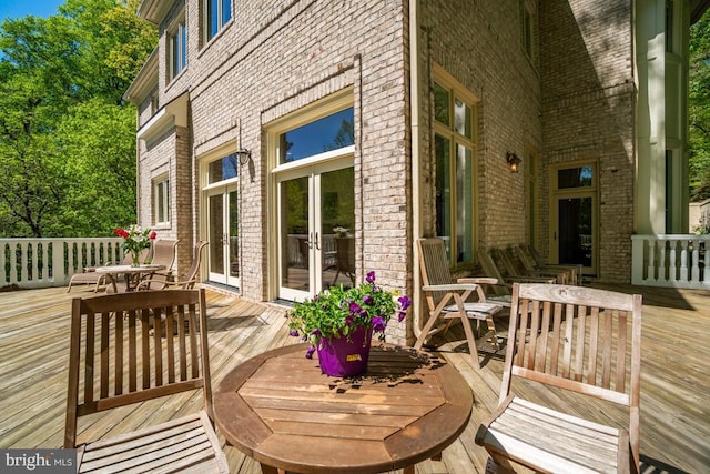 1347 Kirby Rd, Mclean, VA 22101 - wooden deck with french doors and outdoor dining area