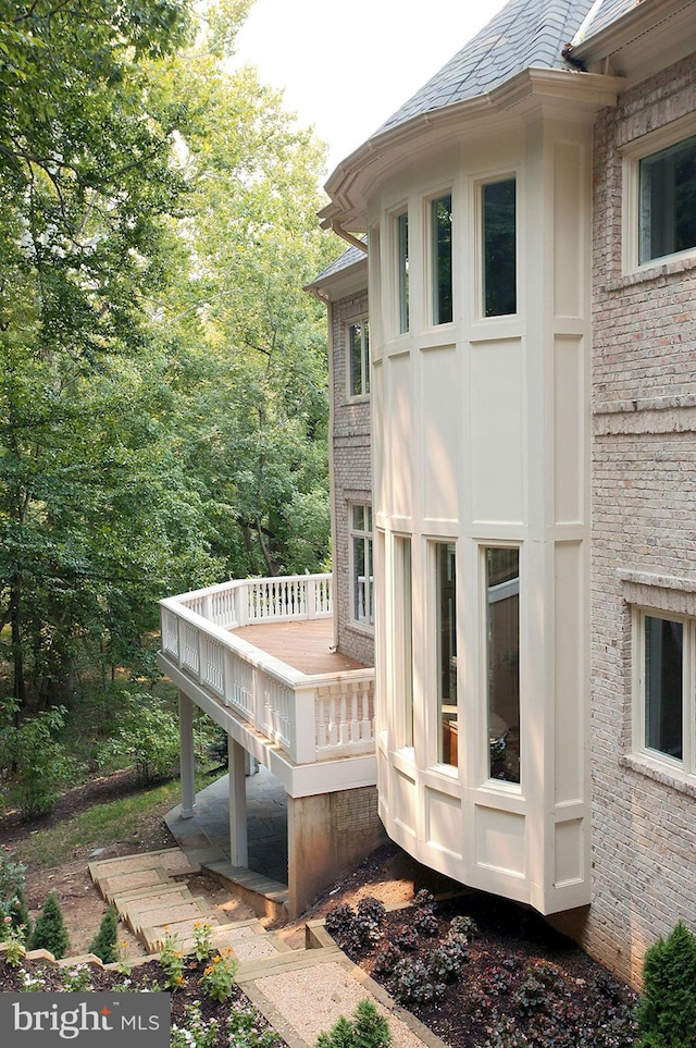 1347 Kirby Rd, Mclean, VA 22101 - view of side of property featuring brick siding and a deck
