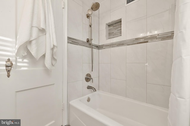 full bathroom with shower / bath combination with curtain